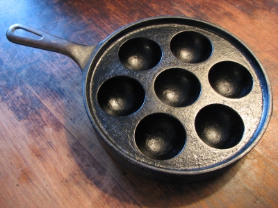 Today's score. Am I correct in thinking the aebleskiver pan is vintage  lodge? The one on  is the only example I can find with the same hole in  the handle. 