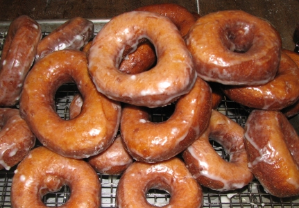 Lots of glazed doughnuts